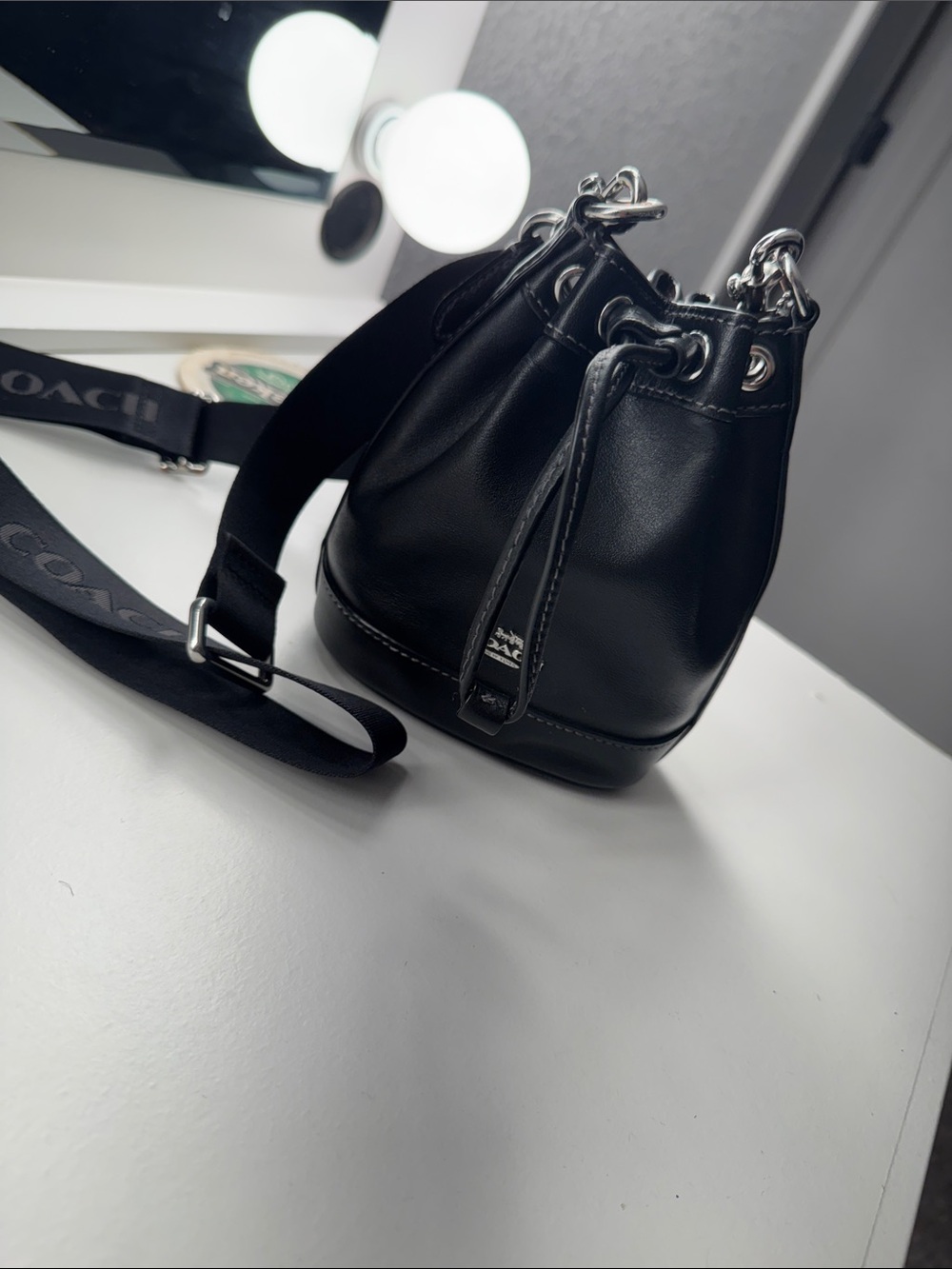 Coach Black Leather Mini Drawstring Bucket Bag with Logo Strap